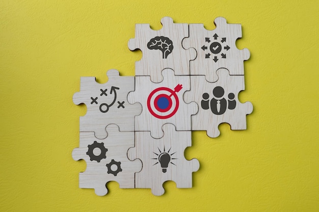 Dartboard with creative business symbols The concept of powering a big idea