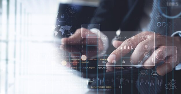 Data science Man programmer using digital tablet computer analyzing and develop software on futuristic virtual interface screen Algorithm digital marketing big data analysis and management