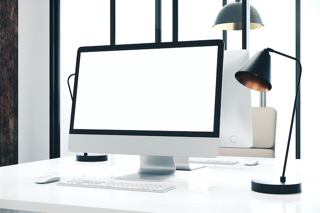 designer desktop with empty computer screen