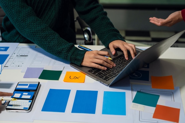 developer and designer brainstorming and color code User experience concept
