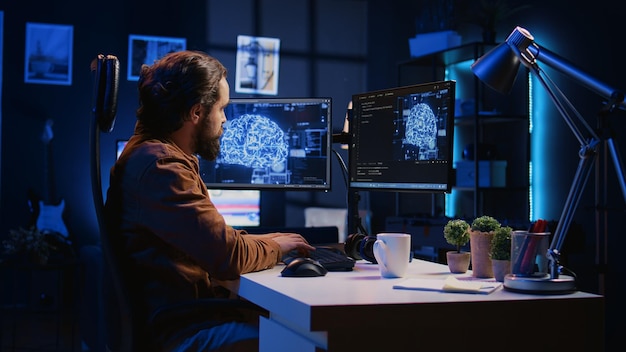 Developer uses computer to update artificial intelligence neural networks