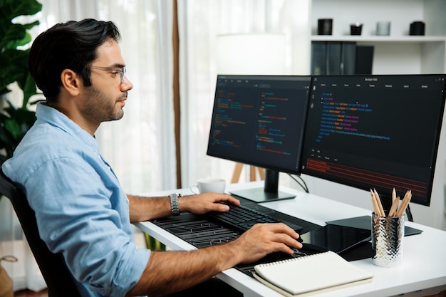 Developer working software development coding two computer code screen Surmise