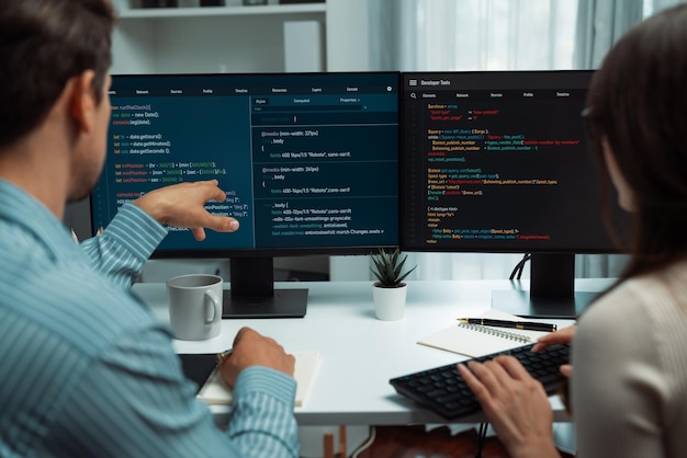 Developers program coding discussing website planning software postulate