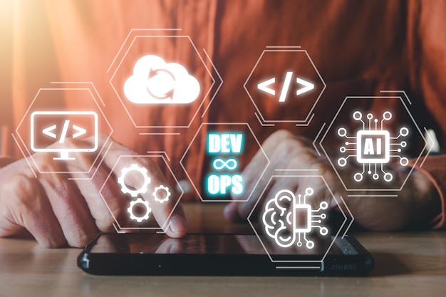 DevOps concept Man hand touching smartphone with DevOps icon on VR screen on desk Methodology development operations agil programming technologyconcept
