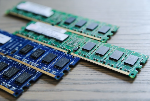 Different memory slots are on the wooden table.
