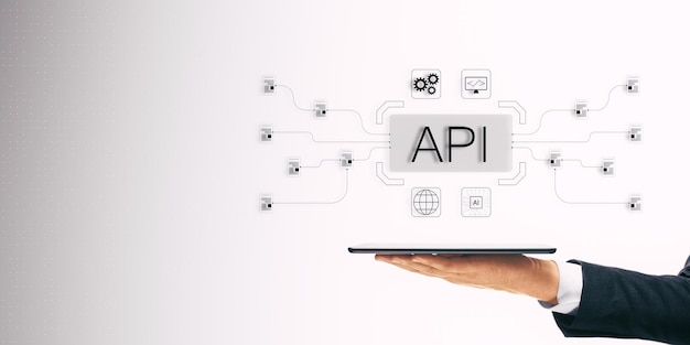 digital api integration concept on tablet displaying various technology icons