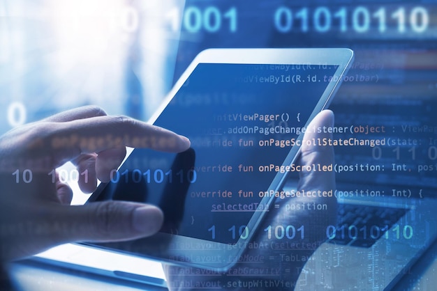 Digital software technology development IoT Internet of Things concept Double exposure man programmer software developer working on laptop computer and smart city binary computer code