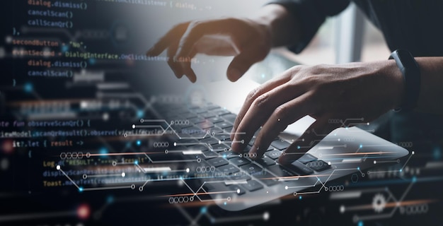 Digital technology software development concept Coding programmer working on laptop with circuit board and javascript on virtual screen