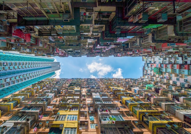 directly below shot of residential buildings against sky