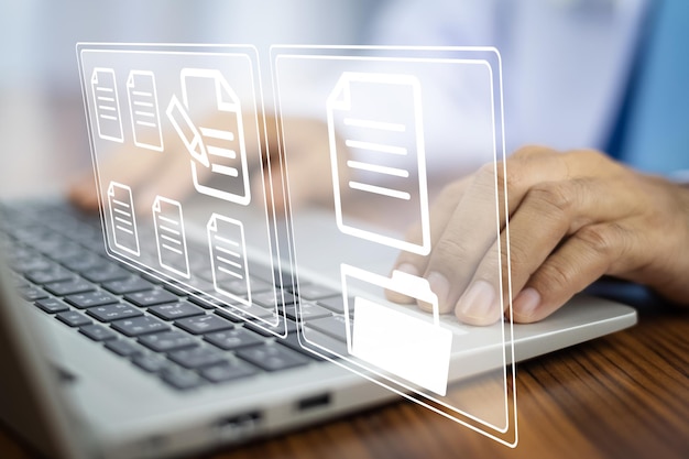 doctor using computer document management system dms online documentation database process automation to efficiently manage files