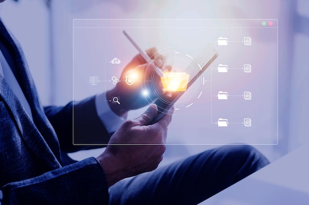 Document management system concept business man holding folder and document icon software searching and managing files online document database for efficient archiving and company data