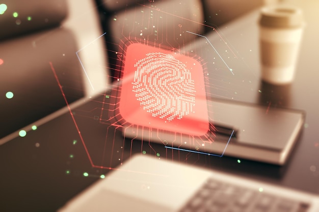 Double exposure of abstract creative fingerprint hologram on laptop background research and development concept