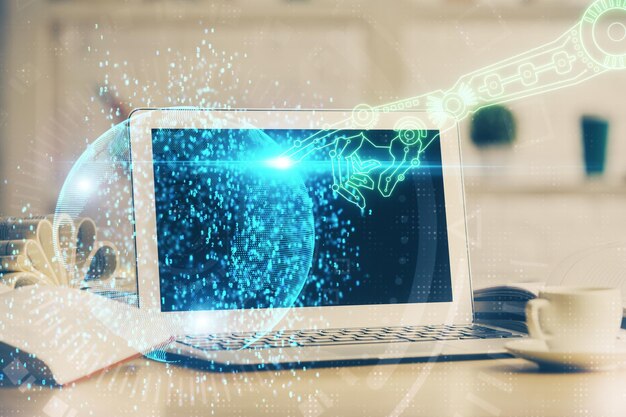 Double exposure of desktop computer and technology theme hologram Concept of software development