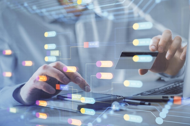 double exposure of man hands holding a credit card and data theme drawing ecommerce and technology concept