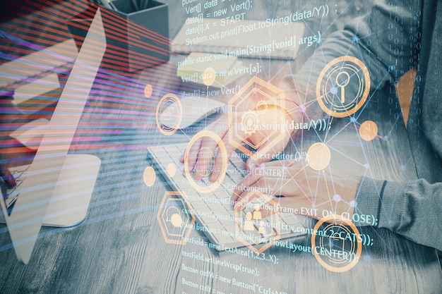 double exposure of tech drawings with hands working on computer background concept of innovation