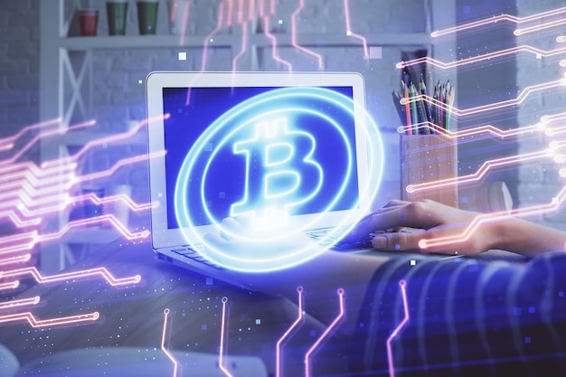 Double exposure of woman hands typing on computer and crypto market theme hologram drawing Blockchain concept