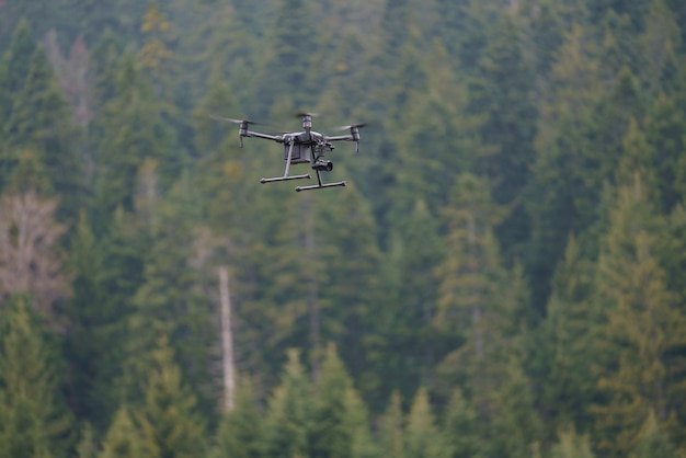 Drone With Dual Cameras Over Forest