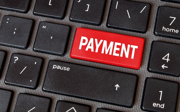 Electronic bill payment financial concept Barcode with a word Payment on a computer keyboard