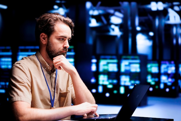Employee overseeing supercomputers