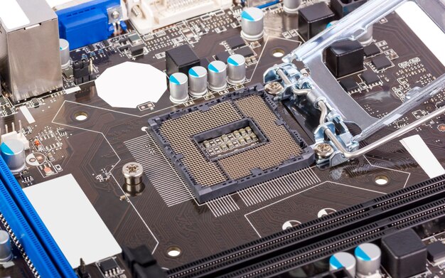 Empty CPU processor socket with pins on motherboard