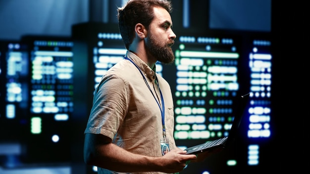 Engineer maintenancing server hub