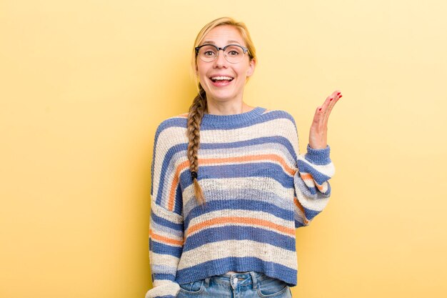 Feeling happy surprised and cheerful smiling with positive attitude realizing a solution or idea