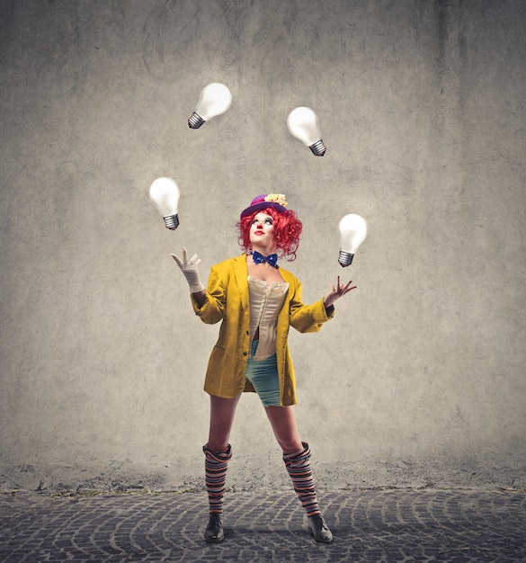 Female clown juggling