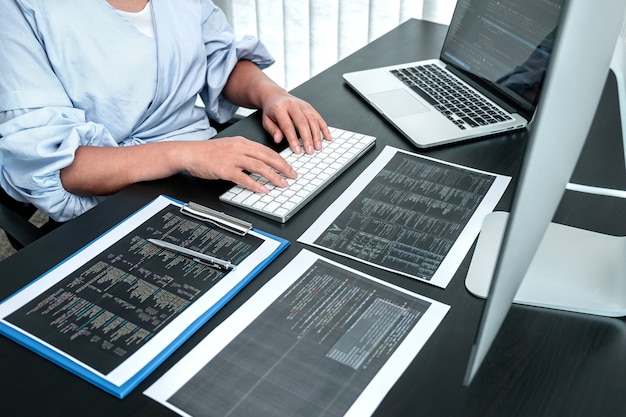 Female Developer programmer working on coding program software computer