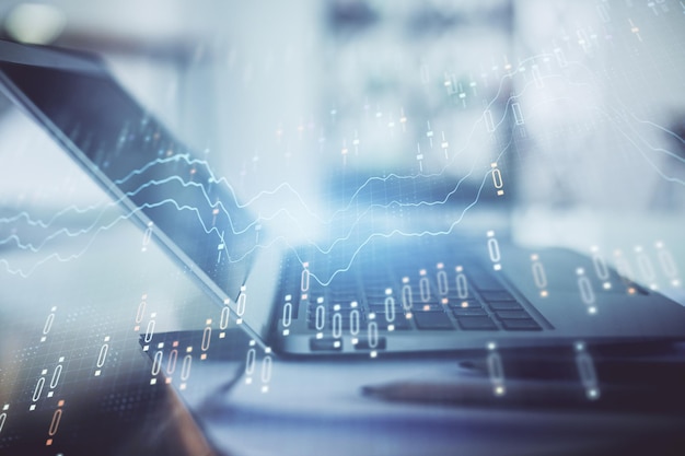 Forex-grafik hologram på bord med datorbakgrund. Dubbelexponering. Koncept för finansmarknader.
