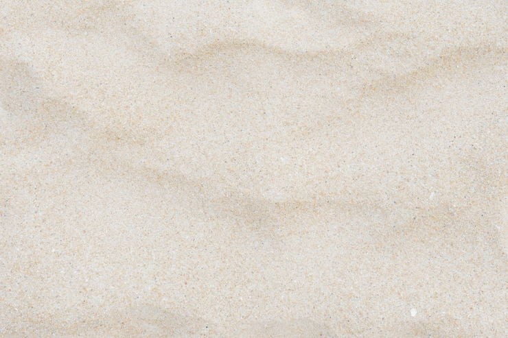 Bild full frame shot closeup of sand texture on the beach.