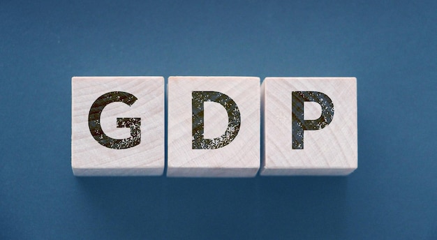 GDP Gross Domestic Product concept cube wooden block with alphabet combine abbreviation GDP measure growth of country economic product and service