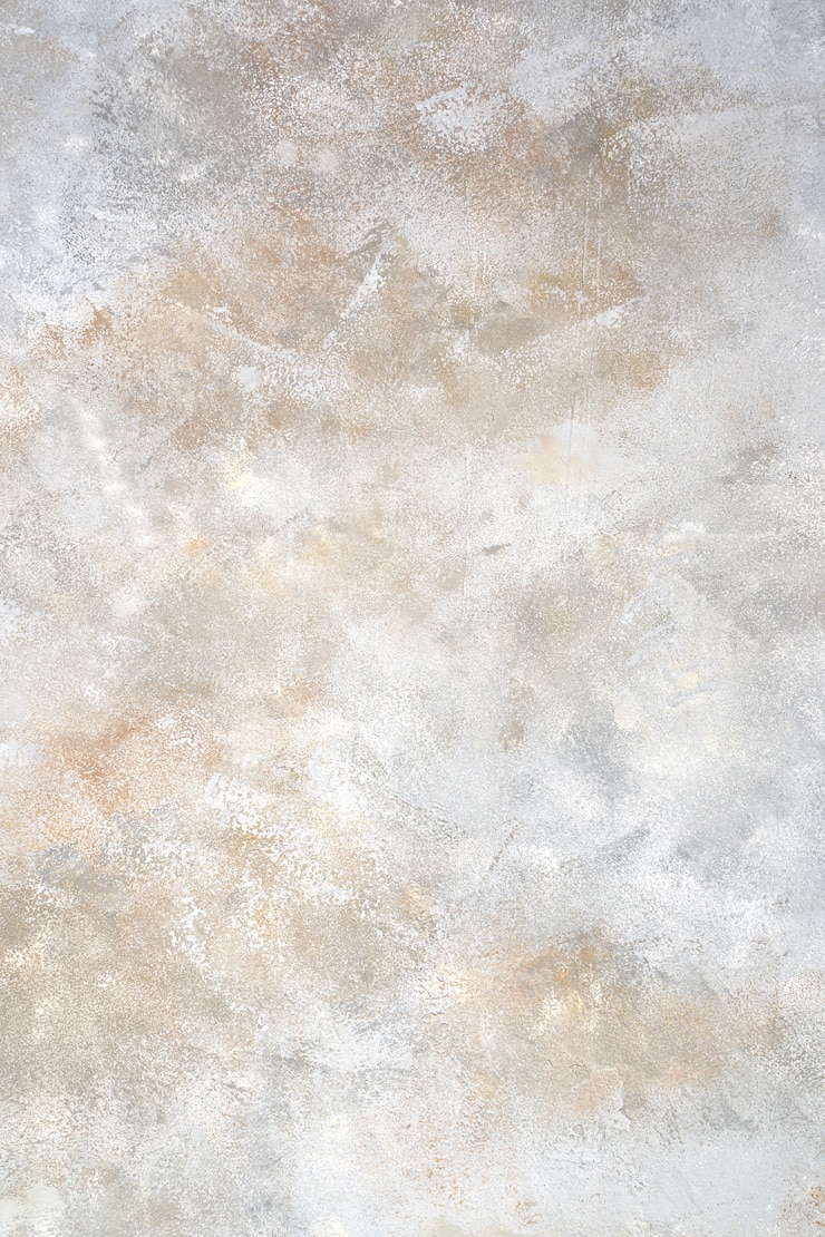 Bild gray concrete surface with white and beige hues