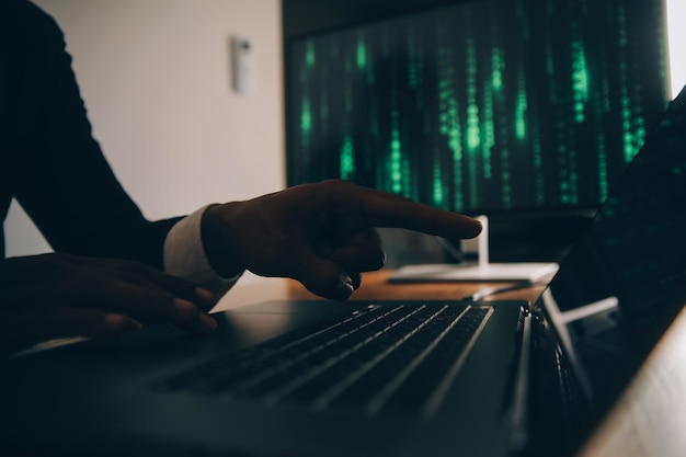 Hacker code in laptop Cyber security privacy or hack threat Coder or programmer writing virus software malware internet attack or developing digital design Green web data in computer screen