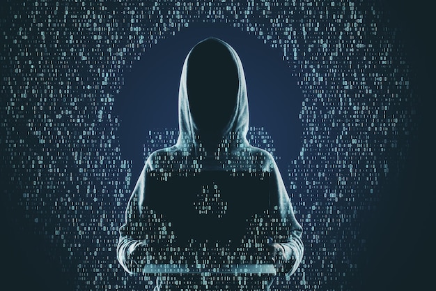 Hacker holding laptop with abstract skull shape