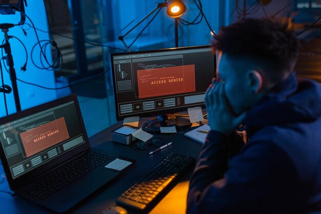 hacker using computer virus for cyber attack