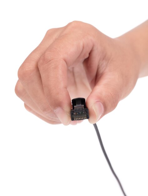 Hand holding LAN connection RJ45 cabl isolated on white background.