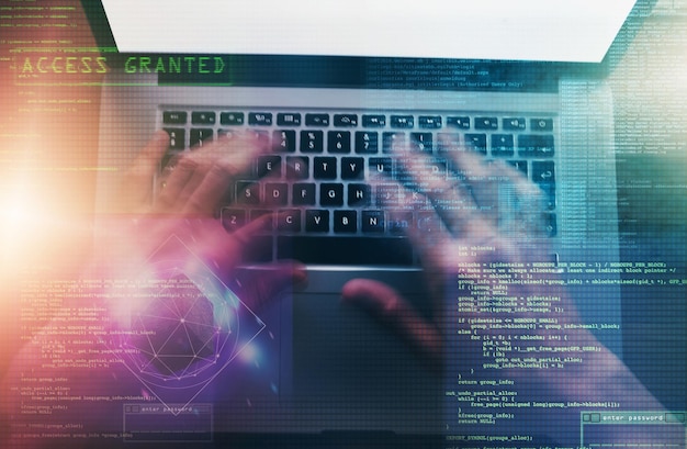 Hands holographic and man with laptop hacker and coding with internet system and keyboard Person programmer and guy with computer overlay and cyber security with access and software update
