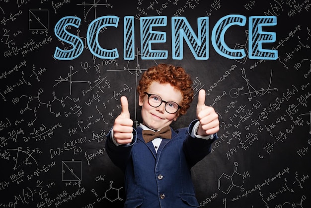 happy kid pupil against science background