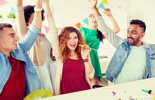 happy team having fun at office party