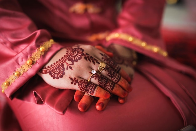 Henna is traditional malay decorative art close-up