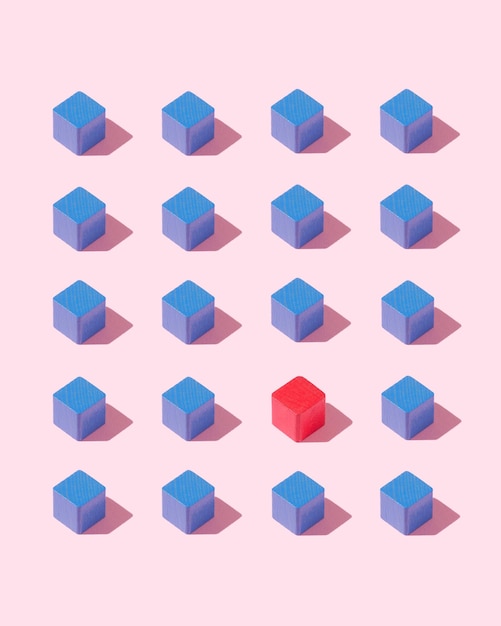 High angle view of blue and red toy blocks arranged on yellow background