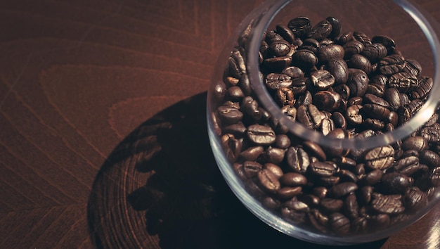 High angle view of coffee beans in container on table