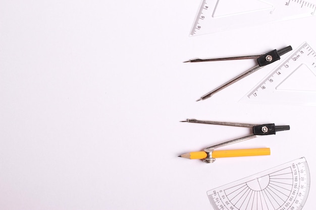 High angle view of colored pencils against white background