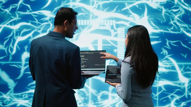 High tech workspace colleagues using AI system doing brainstorming