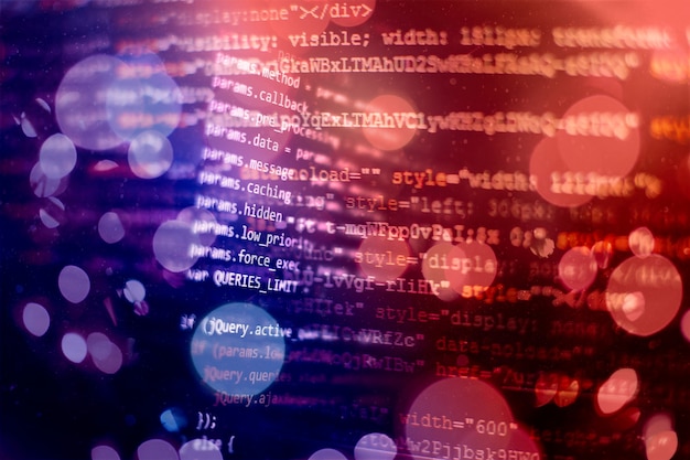 HTML5 i redigeringsværktøj til udvikling af hjemmesider. Billede tæt på af HTML-kode på en bærbar computerskærm.