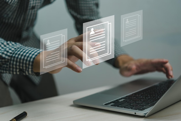 human resources manager searches internet cv to find the ideal candidate company human resources technology digital system business concept