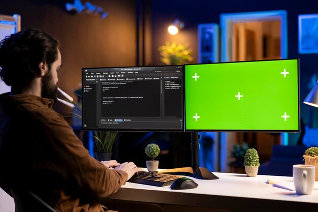 IT expert in apartment working on mockup desktop PC