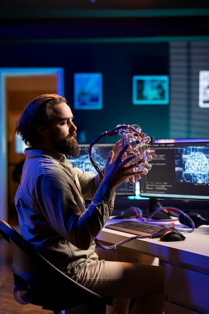 it specialist using high tech device to create link between brain and pc