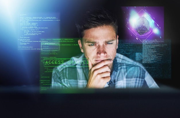 It was only a matter of time Cropped shot of a handsome young male hacker at work