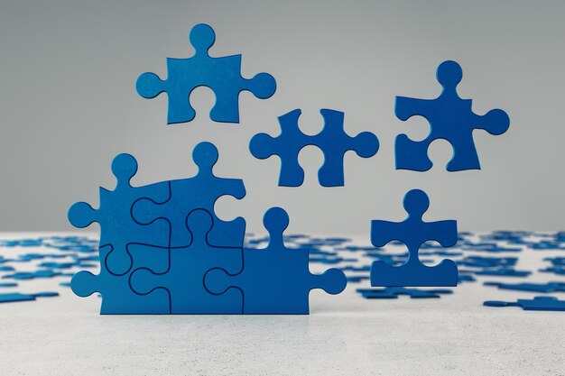 Jigsaw puzzle pieces on a table joint together